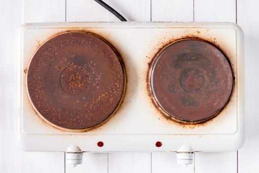 Top view of old rusty electric cooker