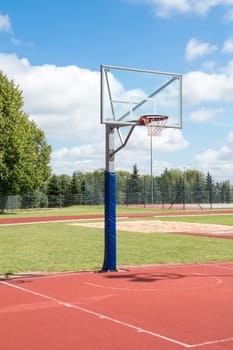 Public outdoor basketball court in a park