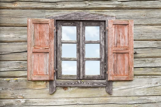 The window of the old wooden log house