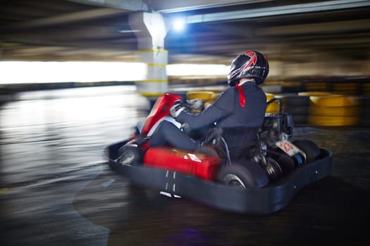 Businessman racing in go-kart