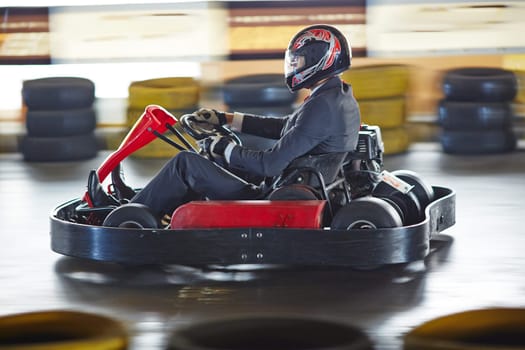 Businessman driving go-kart