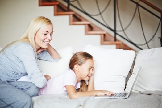 Happy family spending time in front of laptop
