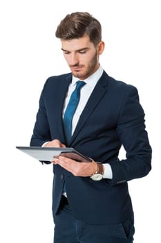 Businessman with a tablet computer touchscreen with his finger while surfing close-up from hands and tablet isolated on white background