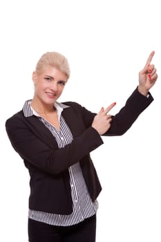 Young woman in business clothes shows with both arms in one direction isolated on white background