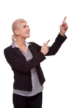 Young woman in business clothes shows with both arms in one direction isolated on white background