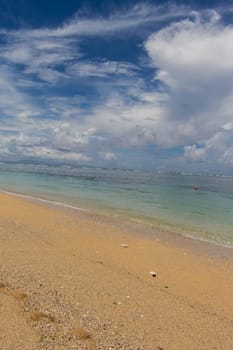 Beautiful secluded sandy beach in the Caribbean with white sand and blue sky as in paradise