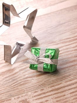 Green gift box with a steel star shape baking tin