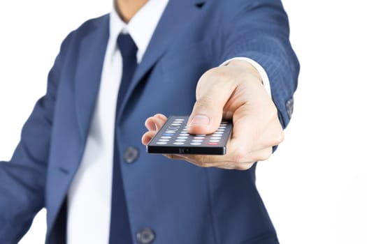 Businessman in Blue Suit Hold Remote Control Isolated on White Background. Concept about Technology or Controlling or Command.