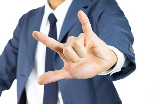 Businessman in Blue Suit Show I Love You Sign or Thumb and Finger and Little Finger Isolated on White Background. Concept about Love or Romance