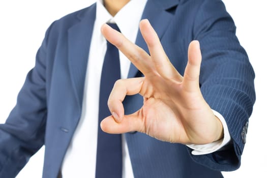 Businessman in Blue Suit Show OK Sign Hand Isolated on White Background. Concept about Acceptance or Agreement