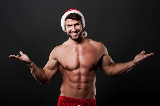 Sexy santa claus with open hands