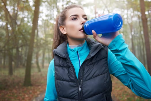 Thirsty woman after the hard training