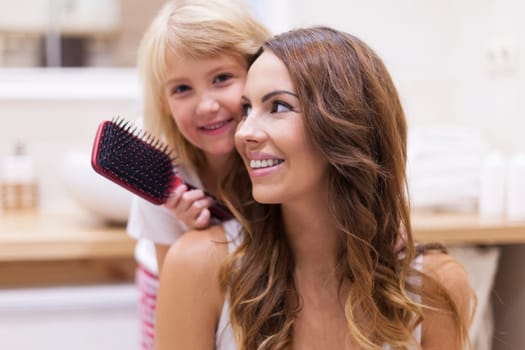 I love combing hair of my mommy