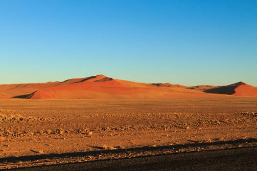 Panorama trought red dunes from Sesriem to Sossusvlei, Namibia