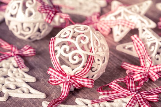 Christmas baubles and glittery xmas decorations with red ribbons