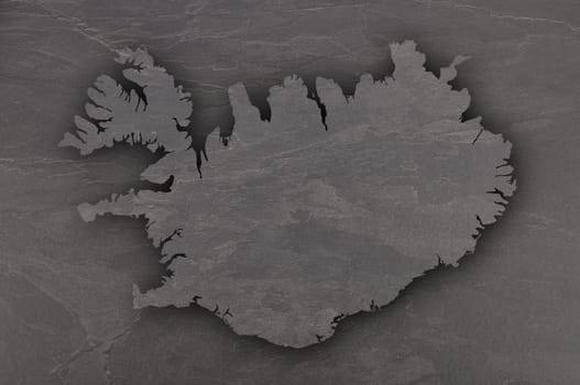 Map of Iceland on dark slate