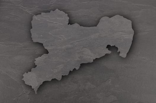 Map of Saxony on dark slate