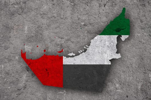 Map and flag of United Arab Emirates on weathered concrete