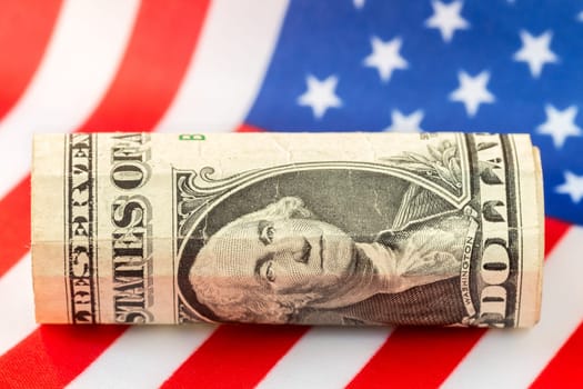 One Dollar over the flag of the United States