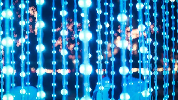 String lights, wood background lightbulbs bokeh merry Christmas street lighting in street party in town garden evening people happy night street bokeh festival on streetlight vibrant bulb party lights string night