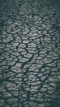 Texture of cracked brown clay soil, crack earth and dry ground. Crack earth, dry ground surface texture.