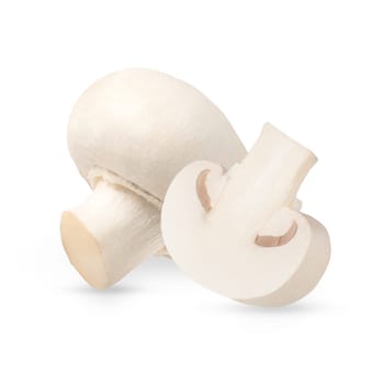 Perfectly retouched whole and half champignon mushrooms isolated on the white background with clipping path. Cultivated bisporus. Organic mushroom macro studio photo. Full depth of field.