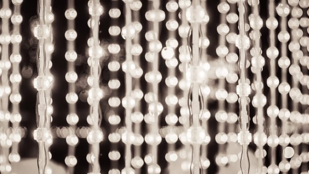 String lights, wood background lightbulbs bokeh merry Christmas street lighting in street party in town garden evening people happy night street bokeh festival on streetlight vibrant bulb party lights string night