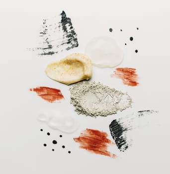 Textures from cosmetics and powder, body scrub, smears on white background. High quality photo