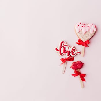 Gingerbread cookies love, lips, heart ice cream. Valentine card. Pink background. High quality photo