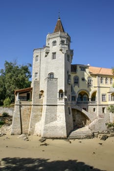 Museu do Mar - Rei D. Carlos (The Museum of the Sea - King Carlos I, founded 1879) photo from sea side on a bright sunny day. Cascais, Portugal