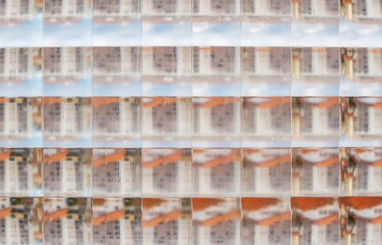 Closeup shot of glass brick also known as glass block texture, abstract background.