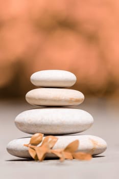 balancing pile of pebble stones, like ZEN stone, outdoor in springtime, spa wellness tranquil scene concept, soul equanimity mental calmness picture