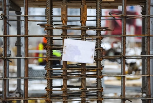 Space for writing on a white sheet of paper attached to steel reinforcement