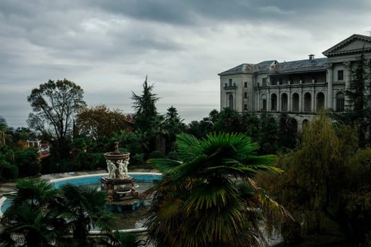 Fountain with statues near the ancient ancient palace. The manor of the master.