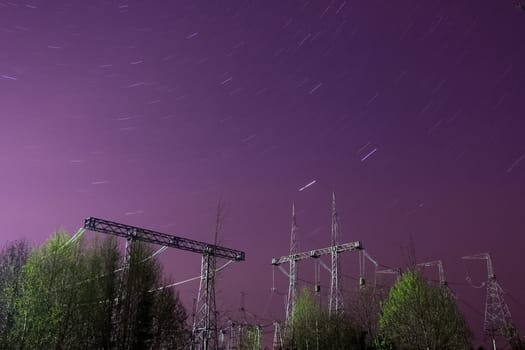 Power line supports. Electricity transmission and posts.
