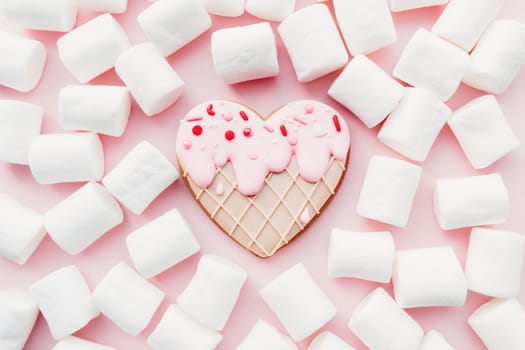 Melt ice cream heart gingerbread cookie, marshmallow. Valentine. Pink background. High quality photo