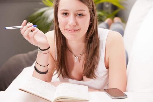 young white girl hard working on her own education