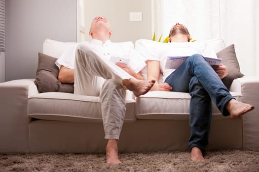 adult friends having fun like teenagers in a living room