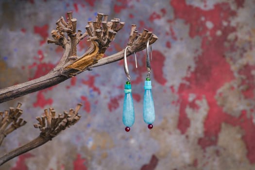 Close up of precious stones earrings, manufactured by Ornella Salamone