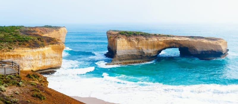 London Bridge at The Twelve Apostles, a famous collection of limestone stacks off the shore of the Port Campbell National Park, by the Great Ocean Road in Victoria, Australia