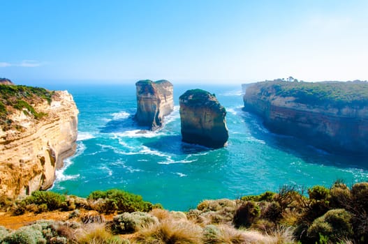 The Twelve Apostles, a famous collection of limestone stacks off the shore of the Port Campbell National Park, by the Great Ocean Road in Victoria, Australia