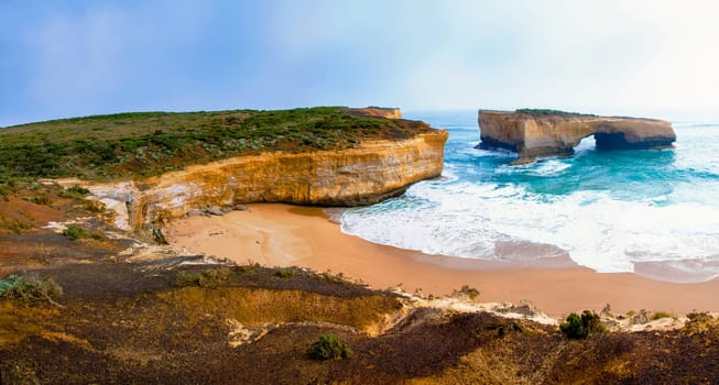 London Bridge at The Twelve Apostles, a famous collection of limestone stacks off the shore of the Port Campbell National Park, by the Great Ocean Road in Victoria, Australia