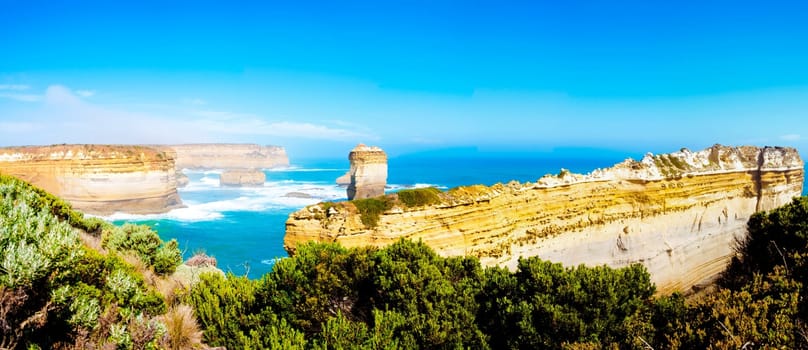 The Twelve Apostles, a famous collection of limestone stacks off the shore of the Port Campbell National Park, by the Great Ocean Road in Victoria, Australia