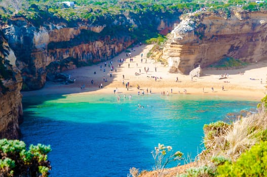 Port Campbell National Park, Victoria state, Australia - February 19, 2015: Tourists visiting the Twelve Apostles, a famous collection of limestone stacks off the shore of the Port Campbell National Park, by the Great Ocean Road in Victoria, Australia