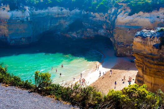 Port Campbell National Park, Victoria state, Australia - February 19, 2015: Tourists visiting the Twelve Apostles, a famous collection of limestone stacks off the shore of the Port Campbell National Park, by the Great Ocean Road in Victoria, Australia