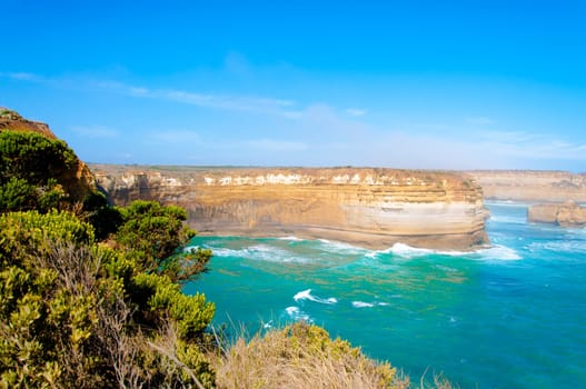 The Twelve Apostles, a famous collection of limestone stacks off the shore of the Port Campbell National Park, by the Great Ocean Road in Victoria, Australia