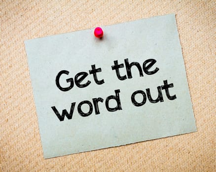 Word of mouth Message. Recycled paper note pinned on cork board. Concept Image