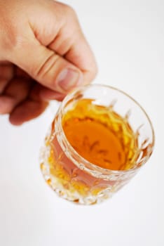 Close-up of a personŽs hand holding a cup of herbal tea