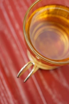 High angle view of a cup of herbal tea