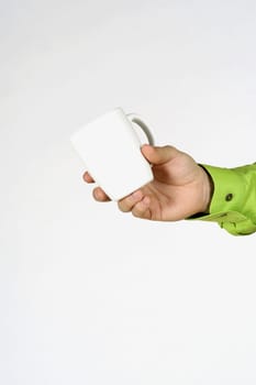 Close-up of a manŽs hand holding a mug